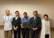 Photo of William J Gies Nizami and team